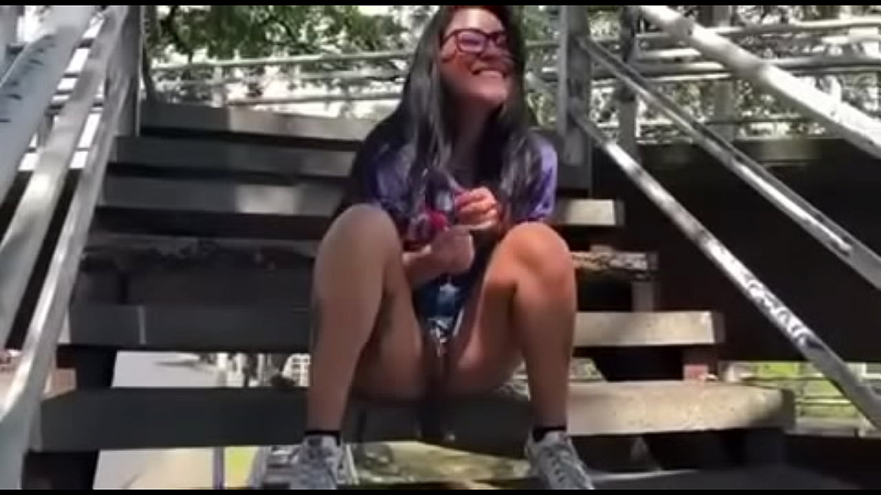Masturbating with a lollipop and squirting on the street